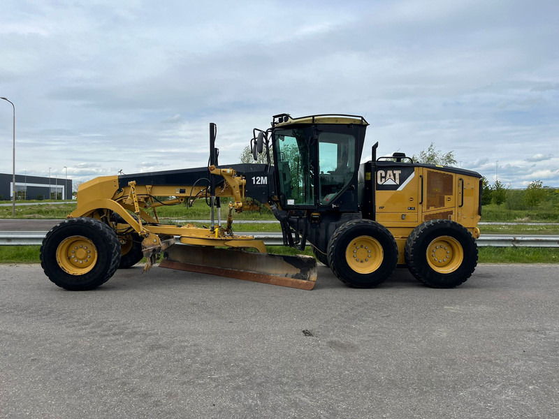 Caterpillar 12M Motor Grader - Порамнувач: слика 1 Caterpillar 12M Motor Grader - Порамнувач: слика 1