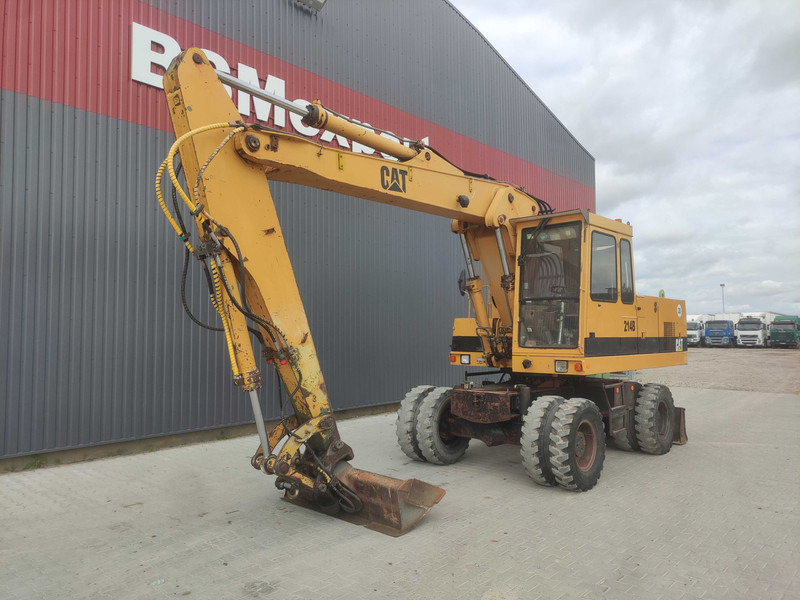 Caterpillar 214 B wheel excavator - Багер на тркала: слика 2 Caterpillar 214 B wheel excavator - Багер на тркала: слика 2
