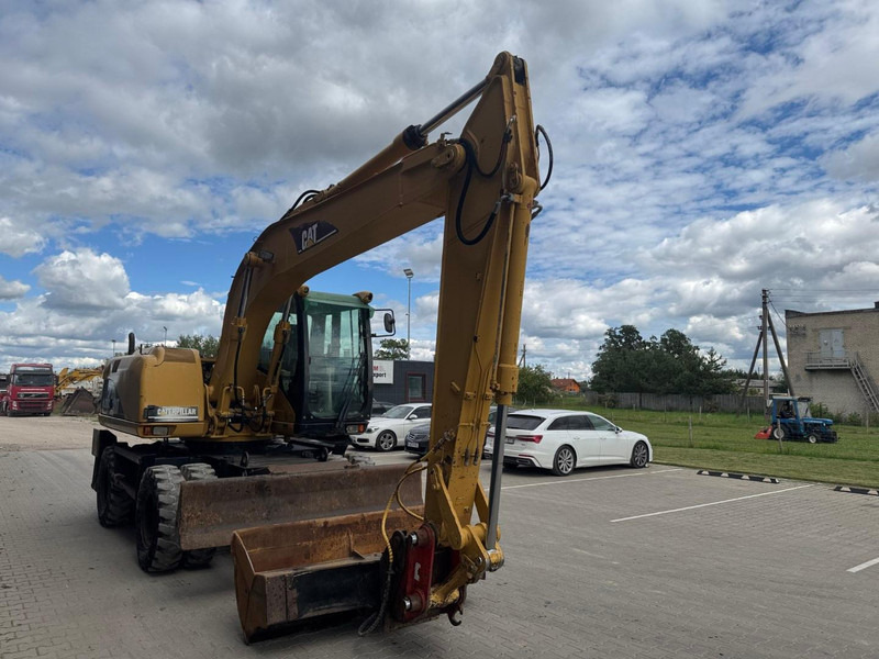 Caterpillar M 315 C - Багер на тркала: слика 2 Caterpillar M 315 C - Багер на тркала: слика 2