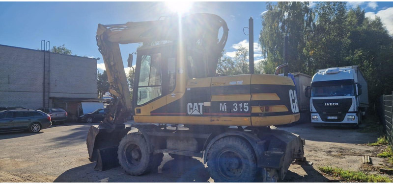 Caterpillar M 315 Rototilt - Багер на тркала: слика 3 Caterpillar M 315 Rototilt - Багер на тркала: слика 3