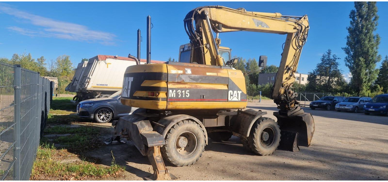Caterpillar M 315 Rototilt - Багер на тркала: слика 2 Caterpillar M 315 Rototilt - Багер на тркала: слика 2