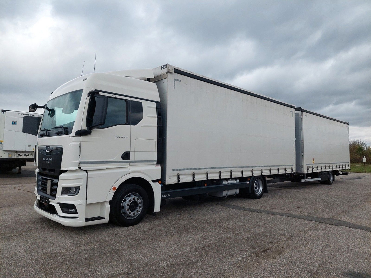 MAN TGX 18.470 LL + Gniotpol G-4080 120 m3 Durchbar - Камион со церада: слика 1 MAN TGX 18.470 LL + Gniotpol G-4080 120 m3 Durchbar - Камион со церада: слика 1