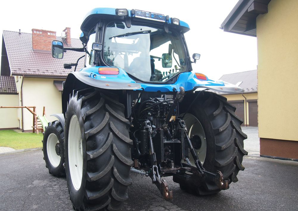 Лизинг на  Ciągnik New Holland NH TS125A 6 cylindrów 2004 Ciągnik rolniczy New Holland TS125A Ciągnik New Holland NH TS125A 6 cylindrów 2004 Ciągnik rolniczy New Holland TS125A: слика 11