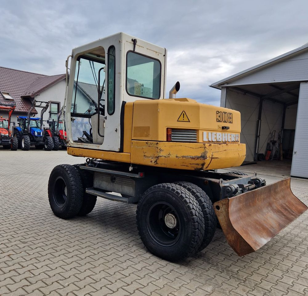 Pozostałe części Liebherr Liebherr A308 1999 Koparka kołowa Liebherr 308 - Багер: слика 4 Pozostałe części Liebherr Liebherr A308 1999 Koparka kołowa Liebherr 308 - Багер: слика 4