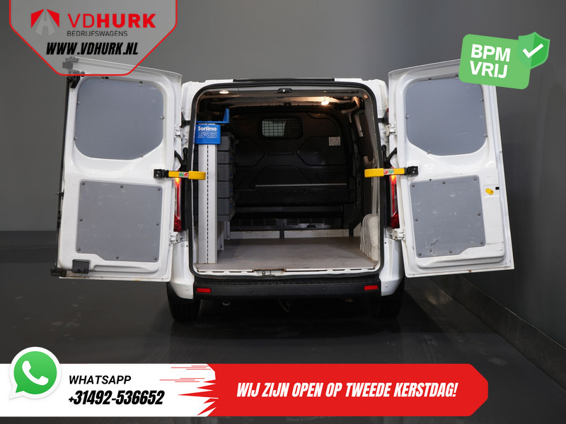 Ford Transit Custom 1.0 130 pk Aut. PHEV BPM VRIJ! Carplay/ Stoelverw./ Sortimo/ Sidebars/ Camera/ PDC/ Cruise/ Airco - Мало комбе: слика 5 Ford Transit Custom 1.0 130 pk Aut. PHEV BPM VRIJ! Carplay/ Stoelverw./ Sortimo/ Sidebars/ Camera/ PDC/ Cruise/ Airco - Мало комбе: слика 5