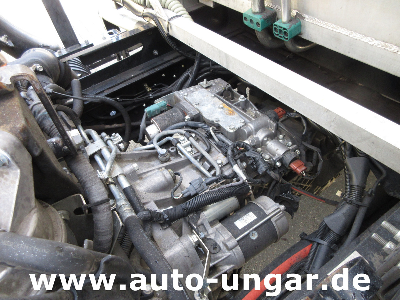 Камион за ѓубре Isuzu NPR 75 Müllwagen Provence Benne - Faun Lifter Presse Kipper Trittbrett Bj 12: слика 15