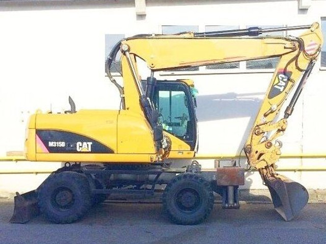 Caterpillar M 315 D - Багер на тркала: слика 1 Caterpillar M 315 D - Багер на тркала: слика 1
