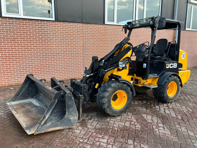 JCB 403 PLUS - Компактен натоварувач со гасеници: слика 1 JCB 403 PLUS - Компактен натоварувач со гасеници: слика 1