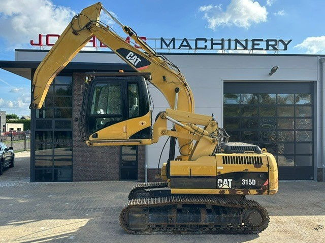 Caterpillar 315DL Material Handler - Багер гасеничар: слика 1 Caterpillar 315DL Material Handler - Багер гасеничар: слика 1