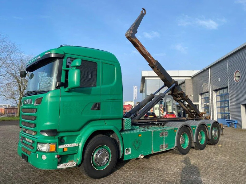 Scania R520 V8 / 8X4 / BIG AXLE / AJK HOOKLIFT 30TON / LIFT+LENKACHSE / NAVI / LEATHER / FULL-AIR / AUTOMATIC / EURO-6 / 2015 - Камион со кука за подигање: слика 1 Scania R520 V8 / 8X4 / BIG AXLE / AJK HOOKLIFT 30TON / LIFT+LENKACHSE / NAVI / LEATHER / FULL-AIR / AUTOMATIC / EURO-6 / 2015 - Камион со кука за подигање: слика 1