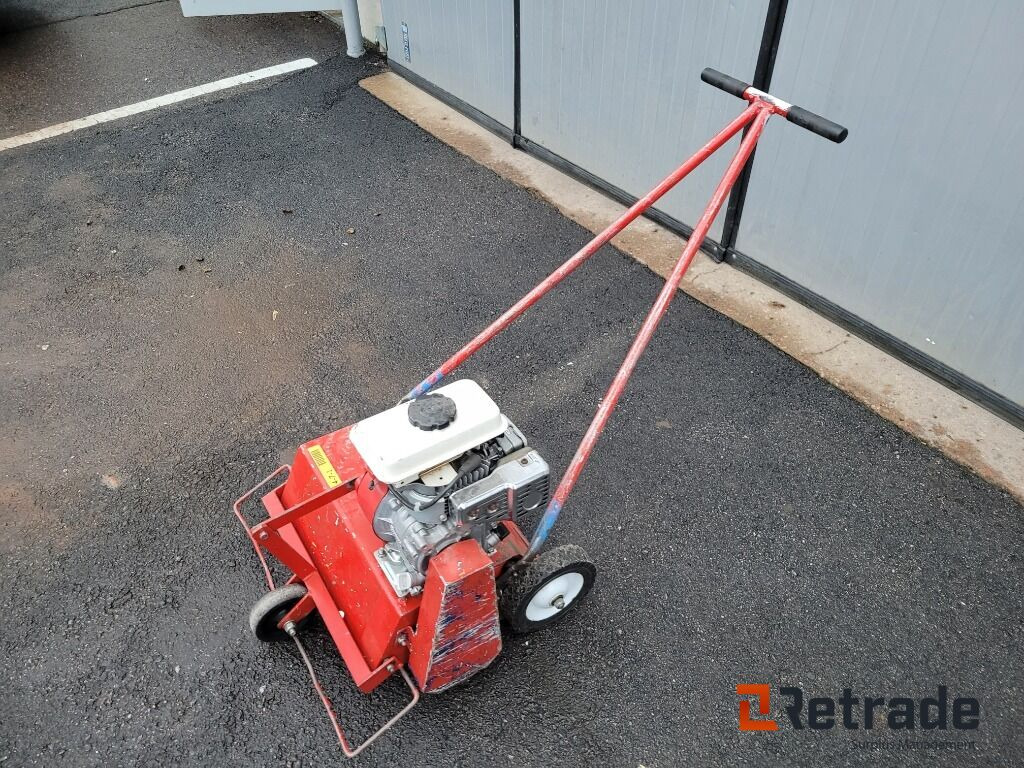 Vertikalskärare gräsmatteluftare Honda - Земјоделска машина: слика 1 Vertikalskärare gräsmatteluftare Honda - Земјоделска машина: слика 1