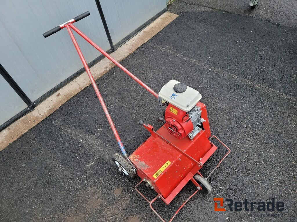 Vertikalskärare gräsmatteluftare Honda - Земјоделска машина: слика 3 Vertikalskärare gräsmatteluftare Honda - Земјоделска машина: слика 3