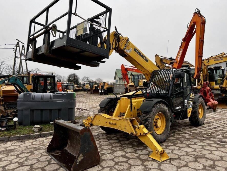 Komatsu WH714 H kosz - Телескопски ракувач: слика 1 Komatsu WH714 H kosz - Телескопски ракувач: слика 1