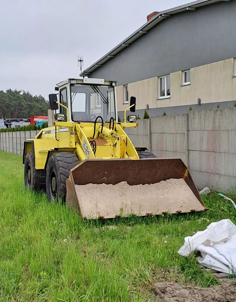 Liebherr L 521 - Натоварувач на тркала: слика 1 Liebherr L 521 - Натоварувач на тркала: слика 1