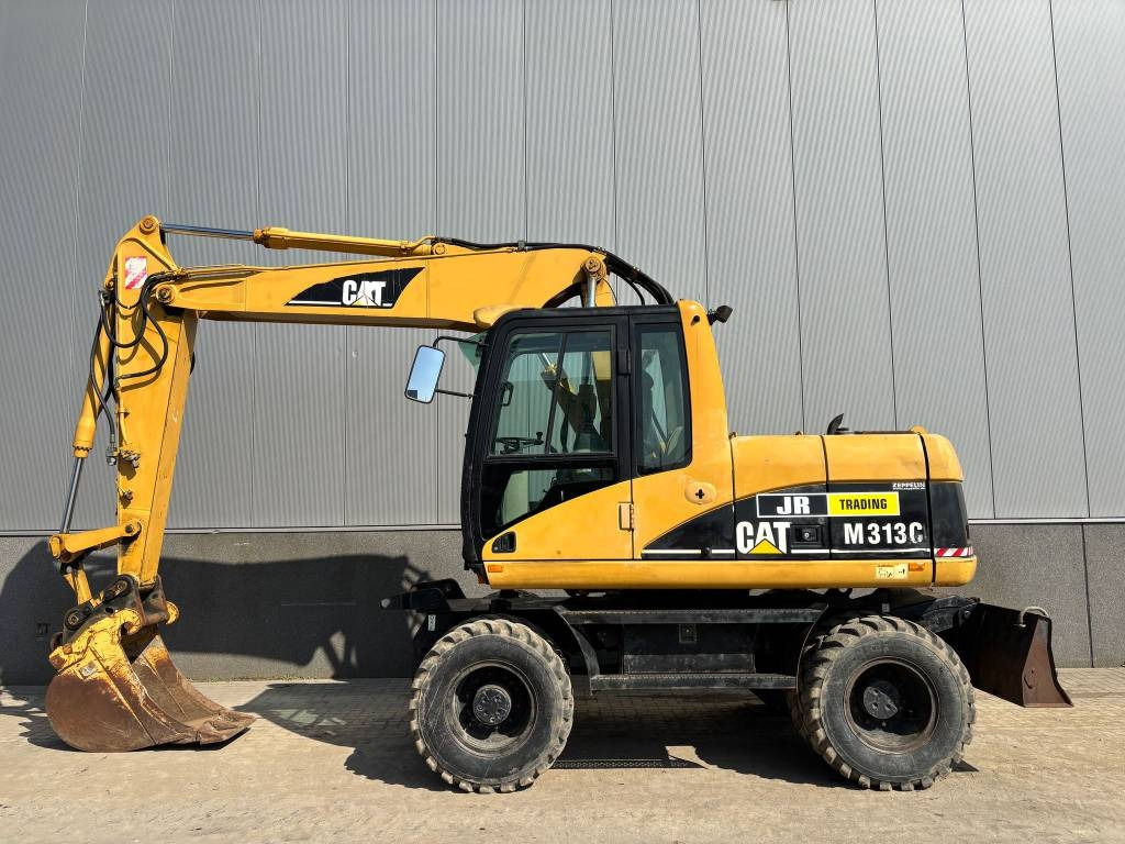 CAT M 313 C (Low verified hours) - Багер на тркала: слика 1 CAT M 313 C (Low verified hours) - Багер на тркала: слика 1