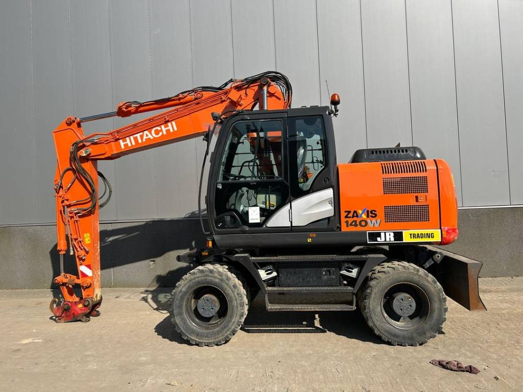 Hitachi ZX 140 W-5B - Багер на тркала: слика 1 Hitachi ZX 140 W-5B - Багер на тркала: слика 1