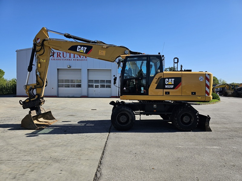 CATERPILLAR M320F - Багер на тркала: слика 2 CATERPILLAR M320F - Багер на тркала: слика 2