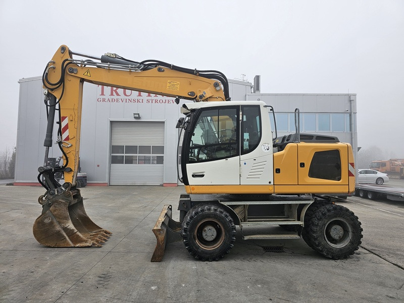 LIEBHERR A916 - Багер на тркала: слика 1 LIEBHERR A916 - Багер на тркала: слика 1