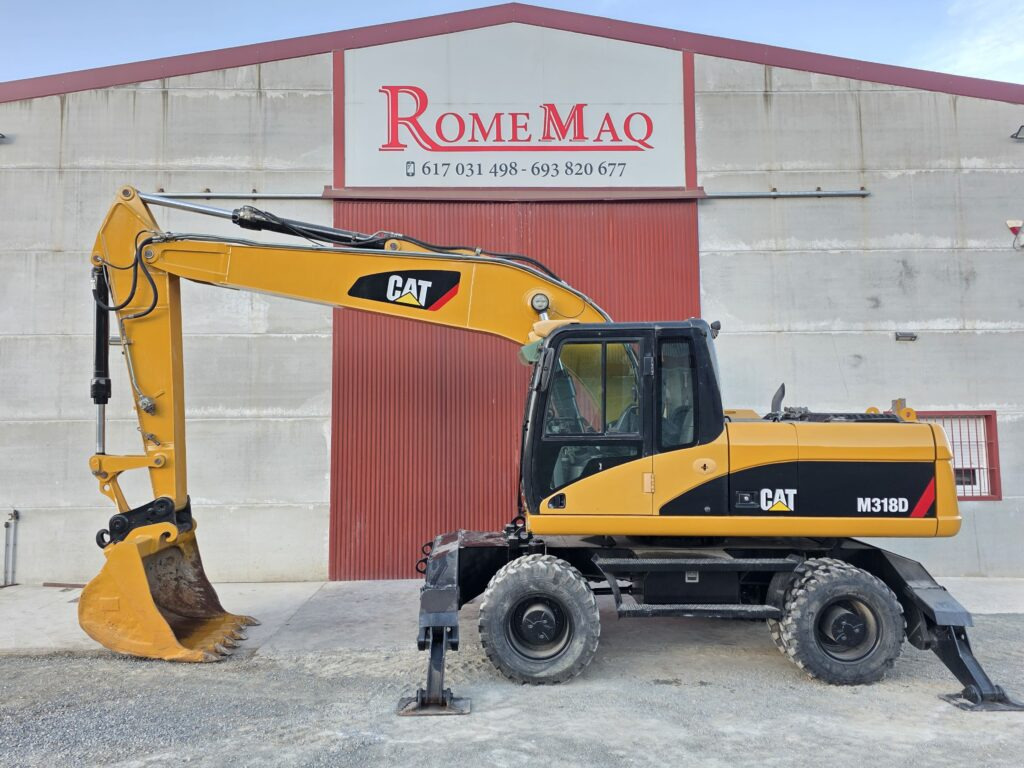 CAT M318D - Багер на тркала: слика 1 CAT M318D - Багер на тркала: слика 1
