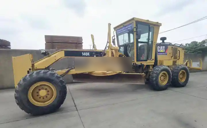 Orginal used cat 140K motor grader with CAT C7 engine in Shanghai China - Порамнувач: слика 2 Orginal used cat 140K motor grader with CAT C7 engine in Shanghai China - Порамнувач: слика 2