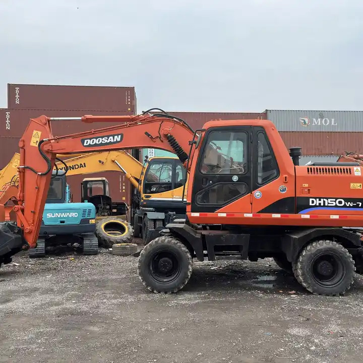 Used Doosan Dh150W-7 Medium 15 Ton Second-Hand Construction Machinery Doosan 60W/150W/210W in Stock - Багер: слика 1 Used Doosan Dh150W-7 Medium 15 Ton Second-Hand Construction Machinery Doosan 60W/150W/210W in Stock - Багер: слика 1