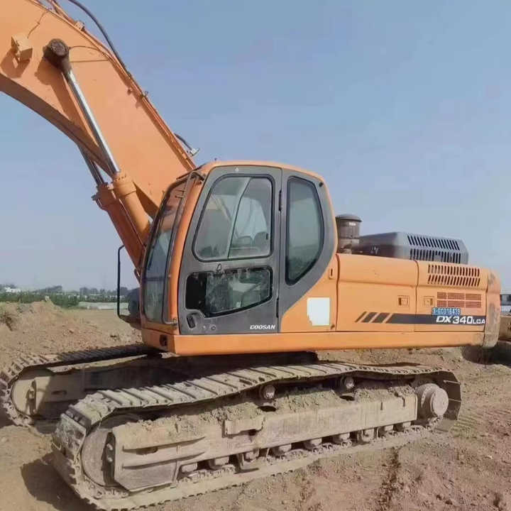 Used Original Korea Doosan 34 Ton Excavator with Cheap Price and Good Condition DOOSAN Dx340LCA Dx225 Dx330 DX360for Sale - Багер: слика 1 Used Original Korea Doosan 34 Ton Excavator with Cheap Price and Good Condition DOOSAN Dx340LCA Dx225 Dx330 DX360for Sale - Багер: слика 1