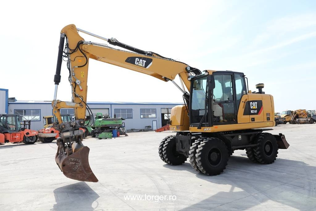 CAT M 314 F - Багер на тркала: слика 1 CAT M 314 F - Багер на тркала: слика 1