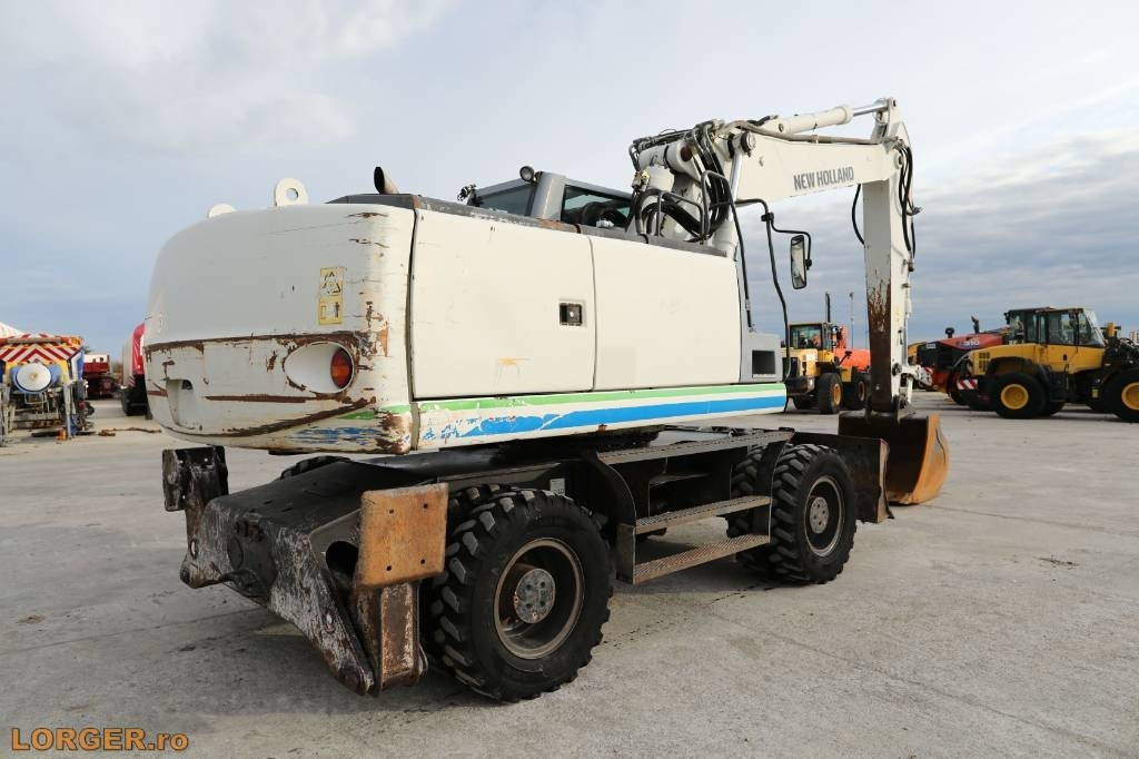 New Holland MH 6.6 + Sandvic Hammer - Багер на тркала: слика 4 New Holland MH 6.6 + Sandvic Hammer - Багер на тркала: слика 4