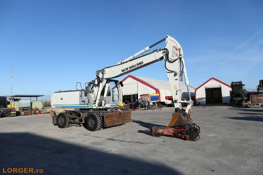 New Holland MH 6.6 + Sandvic Hammer - Багер на тркала: слика 2 New Holland MH 6.6 + Sandvic Hammer - Багер на тркала: слика 2