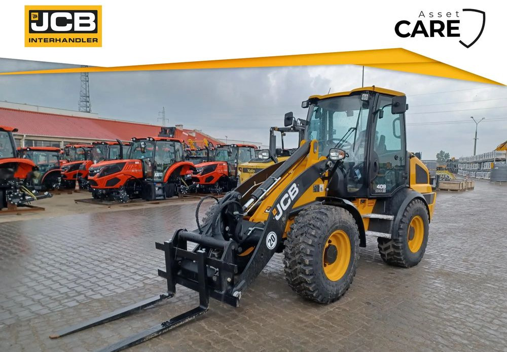 JCB 409 - Натоварувач на тркала: слика 1 JCB 409 - Натоварувач на тркала: слика 1