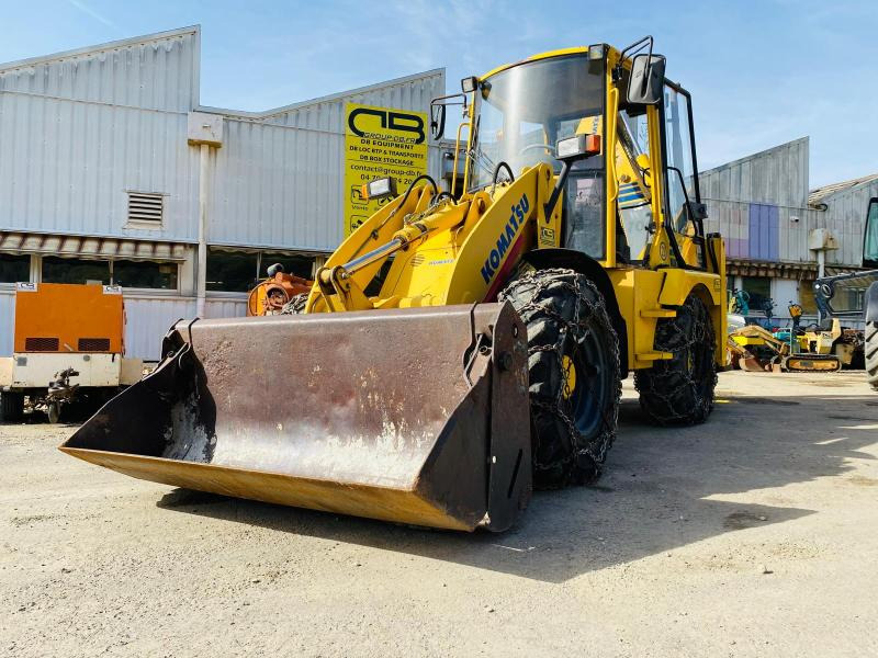KOMATSU Tractopelle WB70 (NET DE TVA) - Ровокопач: слика 1 KOMATSU Tractopelle WB70 (NET DE TVA) - Ровокопач: слика 1