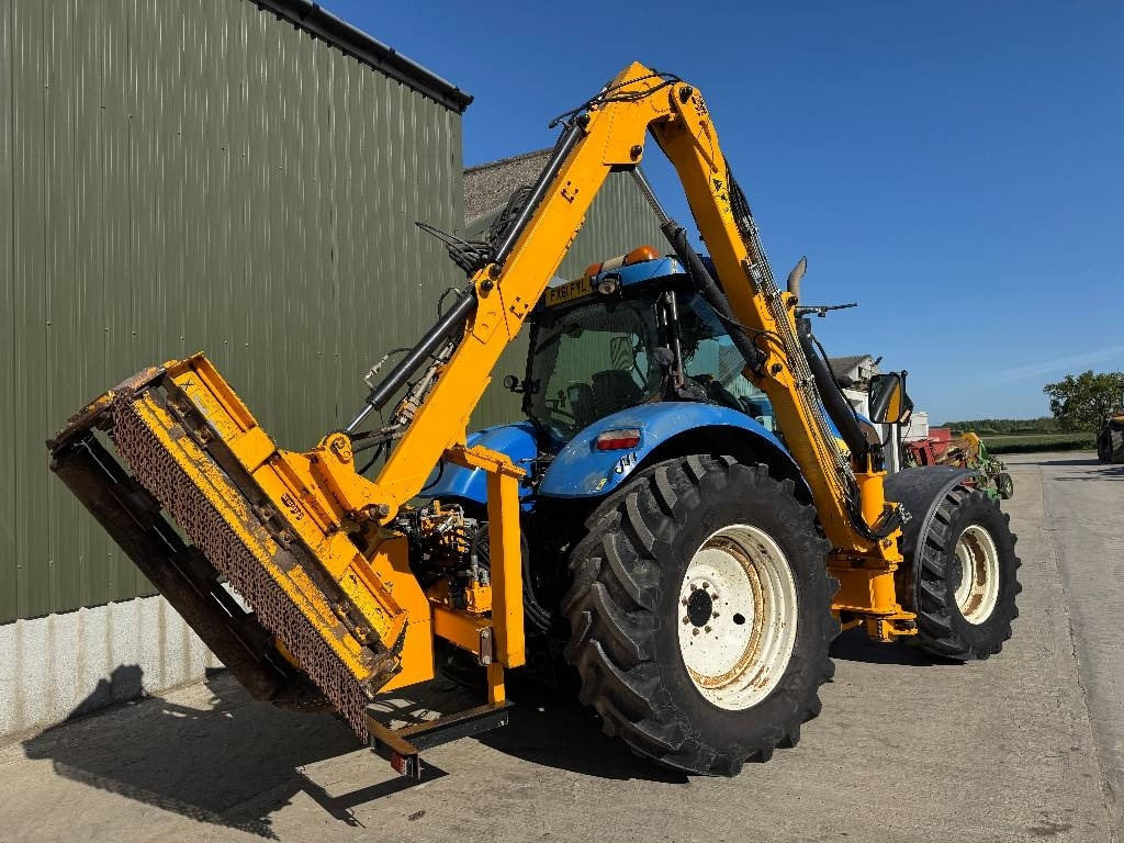 New Holland T6080 c/w Herder Cavalier - Мулчер/ Косилка за жива ограда: слика 4 New Holland T6080 c/w Herder Cavalier - Мулчер/ Косилка за жива ограда: слика 4
