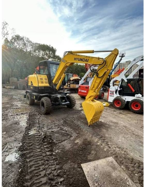 Hyundai 60W-7 - Багер на тркала: слика 1 Hyundai 60W-7 - Багер на тркала: слика 1