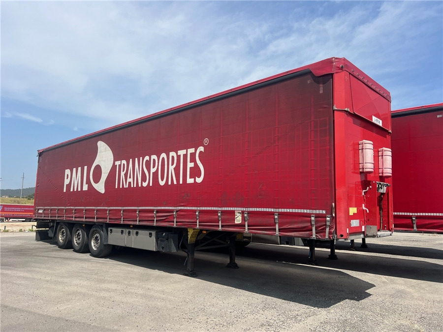 SCHMITZ CARGOBULL SCB-S3T TETO ELEVAR - Полуприколка со церада: слика 1 SCHMITZ CARGOBULL SCB-S3T TETO ELEVAR - Полуприколка со церада: слика 1