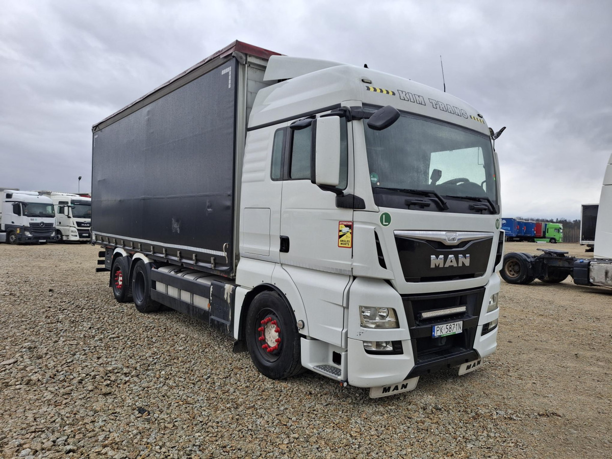 MAN TGX SOLÓWKA - Камион со церада: слика 1 MAN TGX SOLÓWKA - Камион со церада: слика 1