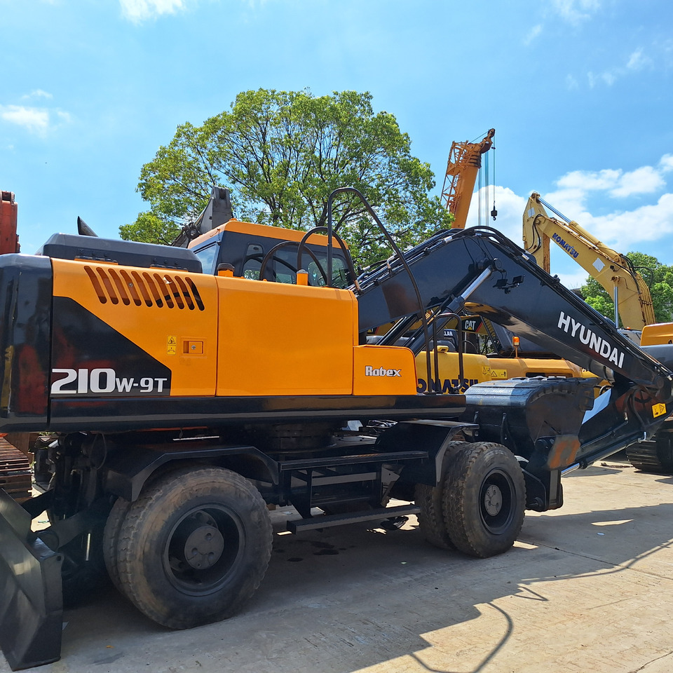 Hyundai 210w-9 wheel excavator - Багер на тркала: слика 1 Hyundai 210w-9 wheel excavator - Багер на тркала: слика 1