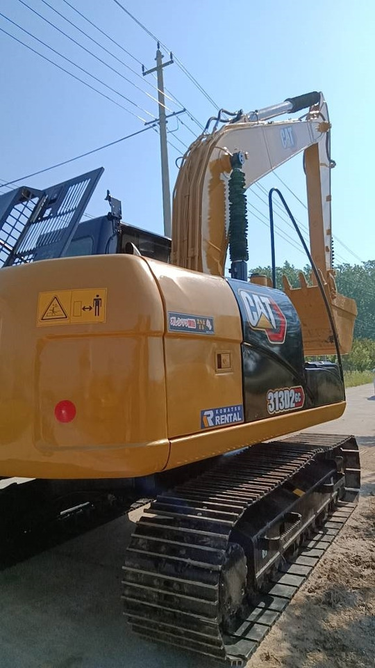 CAT 313 D - Багер на тркала: слика 1 CAT 313 D - Багер на тркала: слика 1