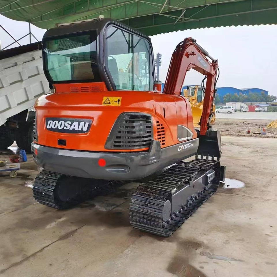 Doosan DX 60 - Мини багер: слика 1 Doosan DX 60 - Мини багер: слика 1