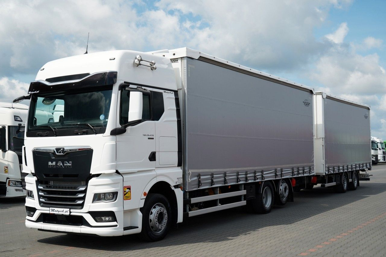 MAN TGX 26.470 / ZESTAW TANDEM 120 M3 / PRZEJAZDOWY - Камион со церада: слика 1 MAN TGX 26.470 / ZESTAW TANDEM 120 M3 / PRZEJAZDOWY - Камион со церада: слика 1