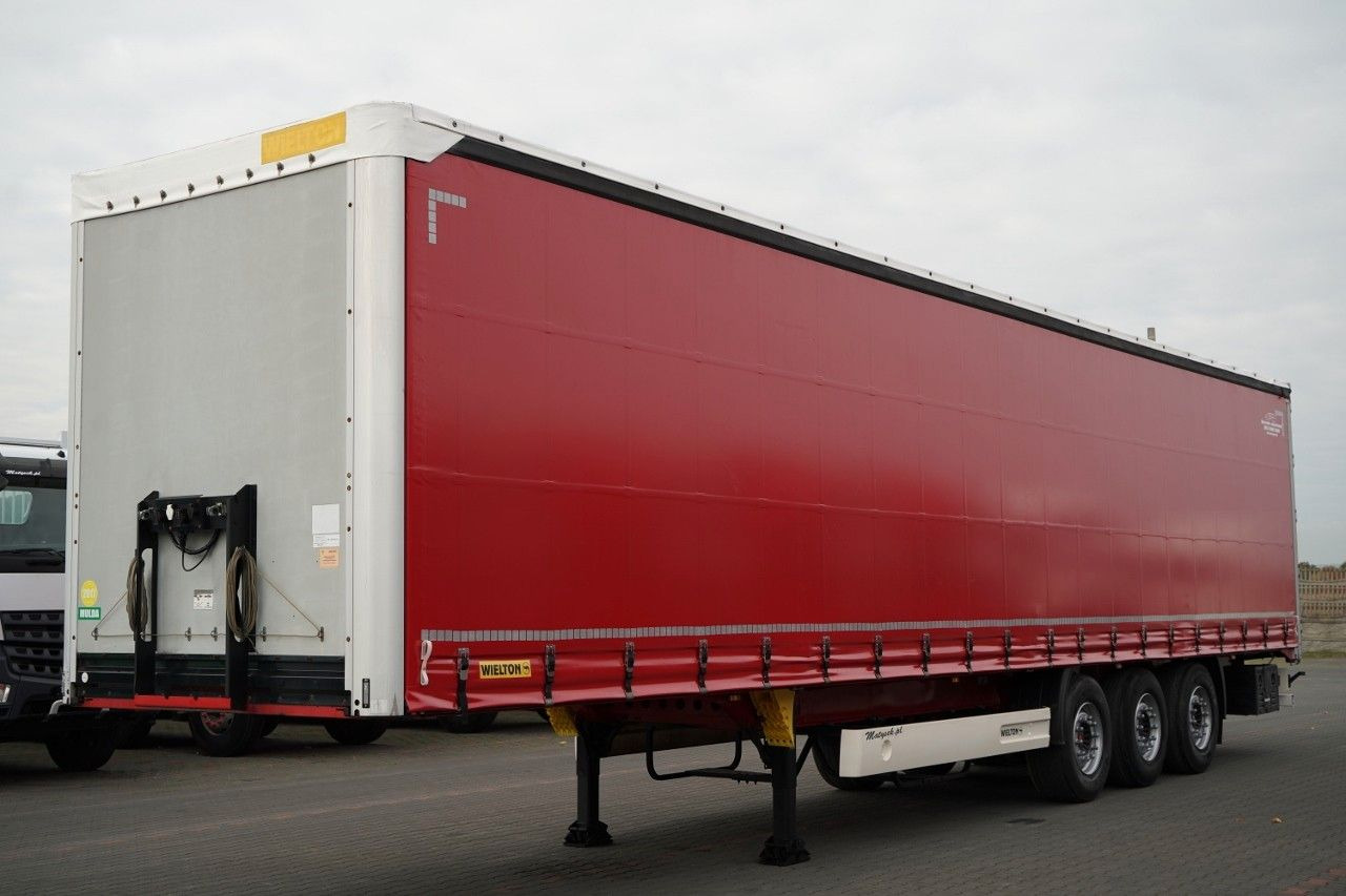 Wielton FIRANKA STANDARD / MULDA DO STALI - 9 M / OŚ PO - Полуприколка со церада: слика 1 Wielton FIRANKA STANDARD / MULDA DO STALI - 9 M / OŚ PO - Полуприколка со церада: слика 1