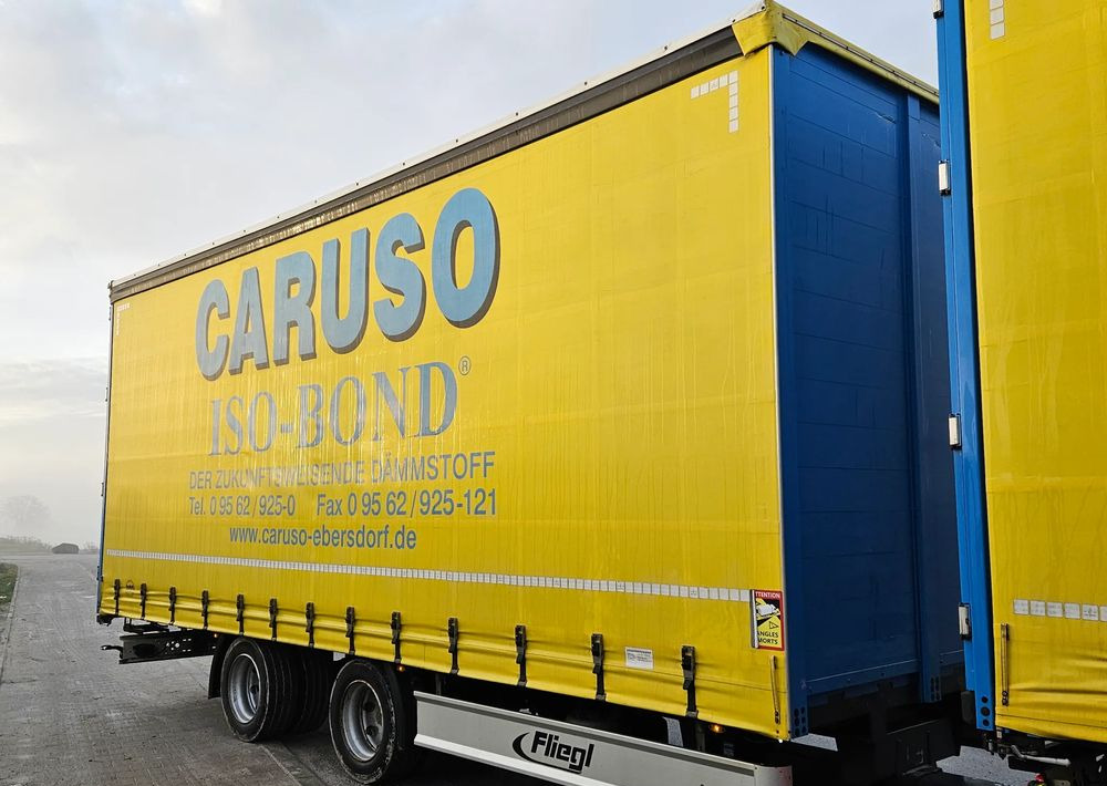 Fliegl PRZYCZEPA CIĘŻAROWA / 60m3 / 2 SZT IDENTYCZNE / NOWE PLANDEKI W CENIE / 3M WYSOKA / TANDEM / 2 OSIE / 19 PALET / DOLNY SPRZĘG / 18 TON DMC / 13 TON ŁADOWNOŚĆ - Приколка со церада: слика 2 Fliegl PRZYCZEPA CIĘŻAROWA / 60m3 / 2 SZT IDENTYCZNE / NOWE PLANDEKI W CENIE / 3M WYSOKA / TANDEM / 2 OSIE / 19 PALET / DOLNY SPRZĘG / 18 TON DMC / 13 TON ŁADOWNOŚĆ - Приколка со церада: слика 2