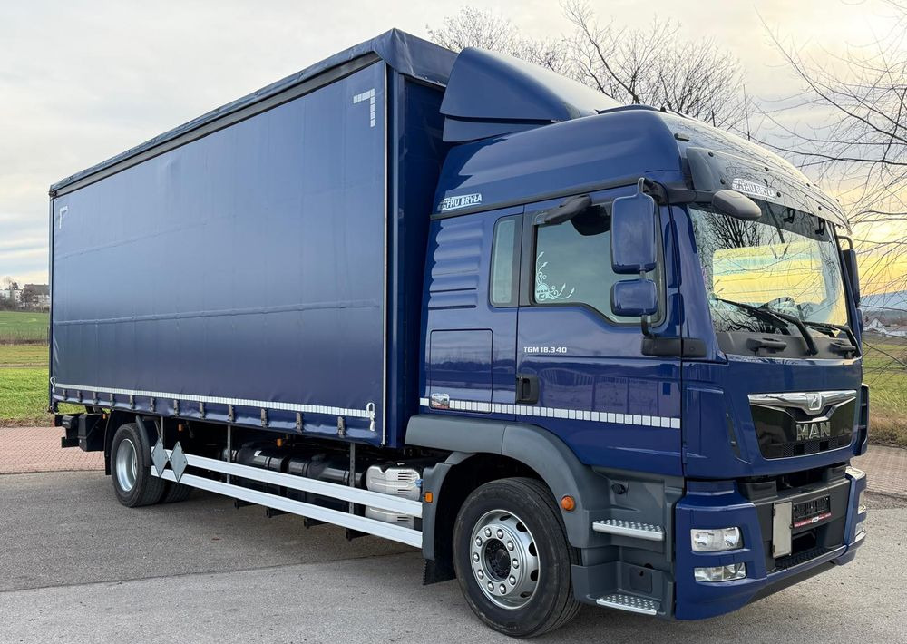 MAN TGM 18.340 / FIRANKA / SPROWADZONY / 9100 ŁADOWNOŚĆ / 18 PALET / E6 / WINDA / - Камион со церада: слика 1 MAN TGM 18.340 / FIRANKA / SPROWADZONY / 9100 ŁADOWNOŚĆ / 18 PALET / E6 / WINDA / - Камион со церада: слика 1