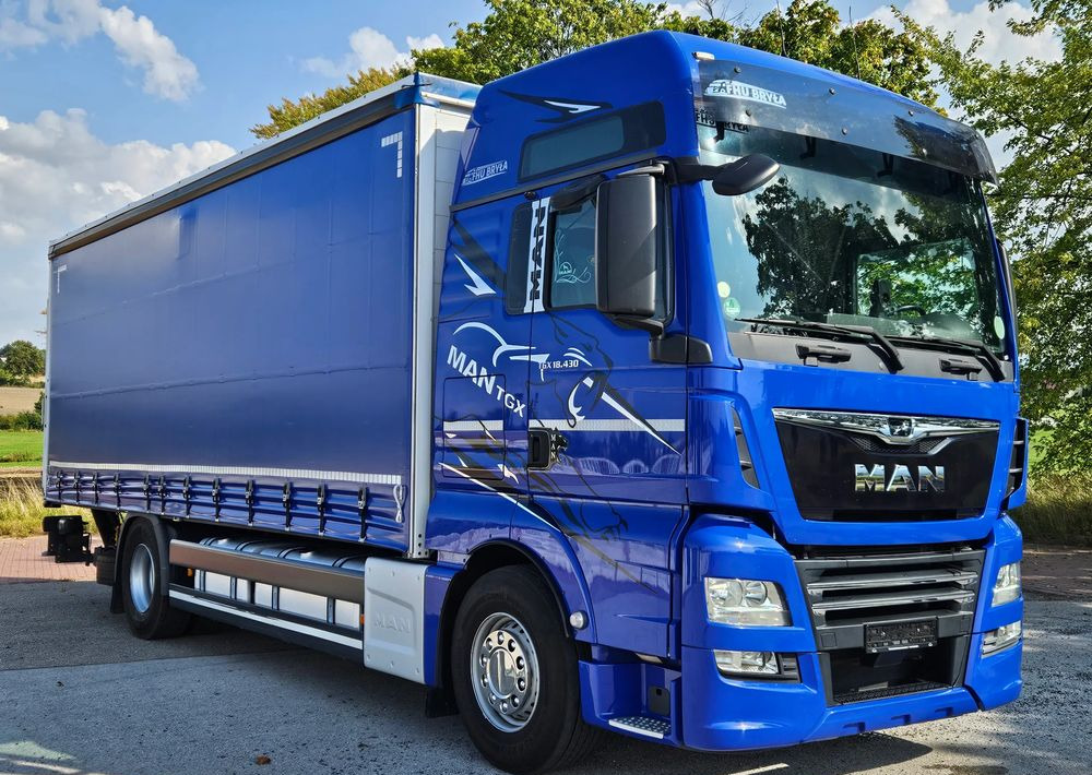 MAN TGX 18.430 / FIRANKA / WINDA / KLIMA POSTOJOWA / 300TYŚ PRZEBIEG / 2020 /E6 / KLIMA POSTOJOWA / SPROWADZONY / JAK NOWY / AUTOMAT - Камион со церада: слика 1 MAN TGX 18.430 / FIRANKA / WINDA / KLIMA POSTOJOWA / 300TYŚ PRZEBIEG / 2020 /E6 / KLIMA POSTOJOWA / SPROWADZONY / JAK NOWY / AUTOMAT - Камион со церада: слика 1