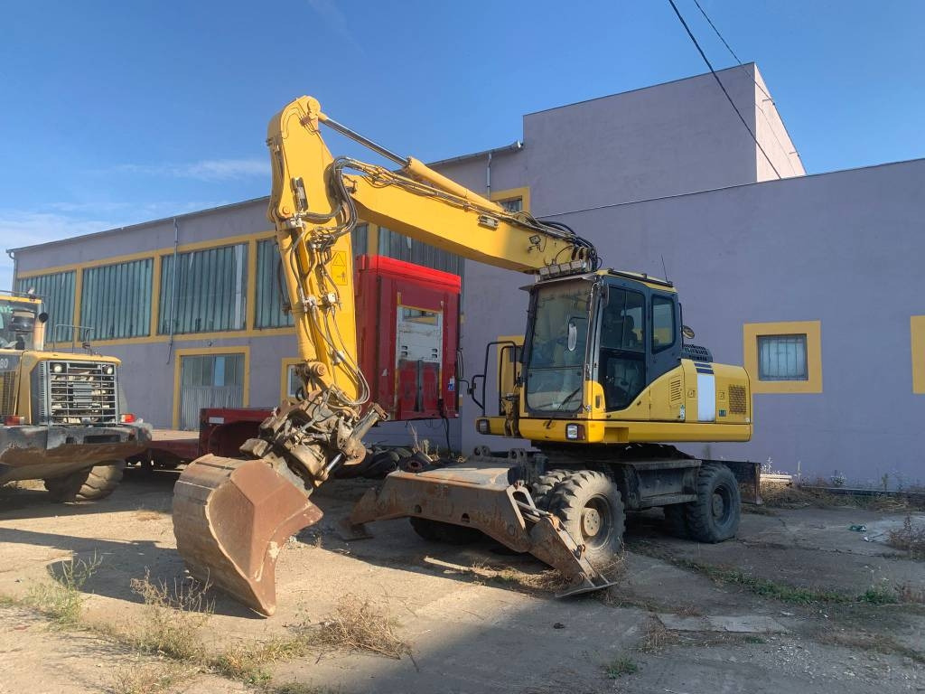 Komatsu PW180-E0+Engcon Rototilt  - Багер на тркала: слика 1 Komatsu PW180-E0+Engcon Rototilt  - Багер на тркала: слика 1