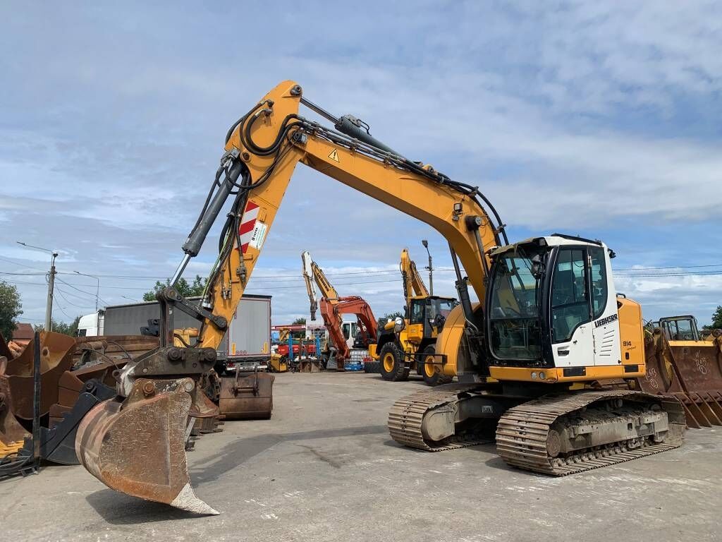 Liebherr R 914 Compact Litronic Liebherr R 914 Compact Litronic - Багер на тркала: слика 1 Liebherr R 914 Compact Litronic Liebherr R 914 Compact Litronic - Багер на тркала: слика 1