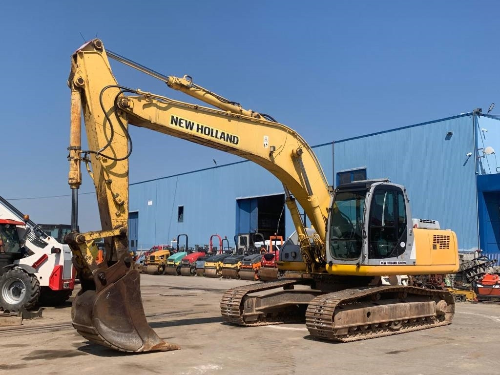 New Holland Kobelco E265 - Багер гасеничар: слика 1 New Holland Kobelco E265 - Багер гасеничар: слика 1