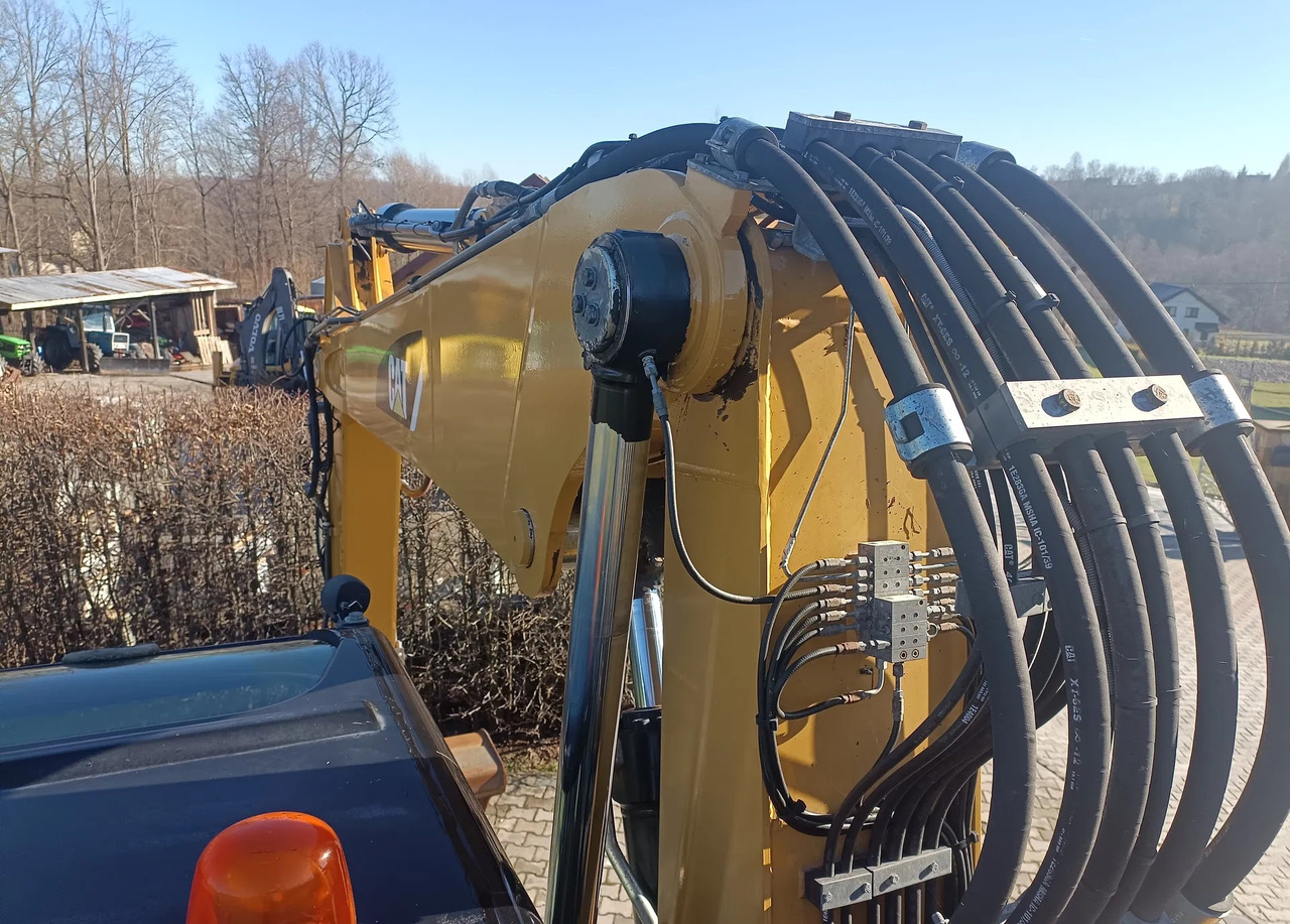 CATERPILLAR M313D - Багер на тркала: слика 4 CATERPILLAR M313D - Багер на тркала: слика 4