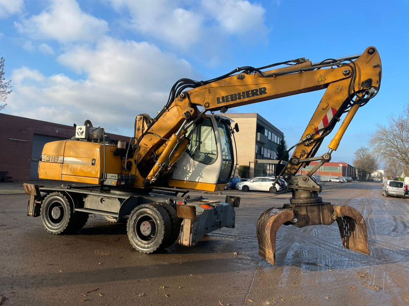 Liebherr A 316 - Багер на тркала: слика 4 Liebherr A 316 - Багер на тркала: слика 4