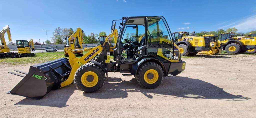 Komatsu WA 70 - Натоварувач на тркала: слика 1 Komatsu WA 70 - Натоварувач на тркала: слика 1