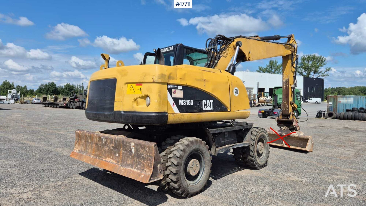 Багер на тркала 2008 CAT M316D: слика 11 Багер на тркала 2008 CAT M316D: слика 11